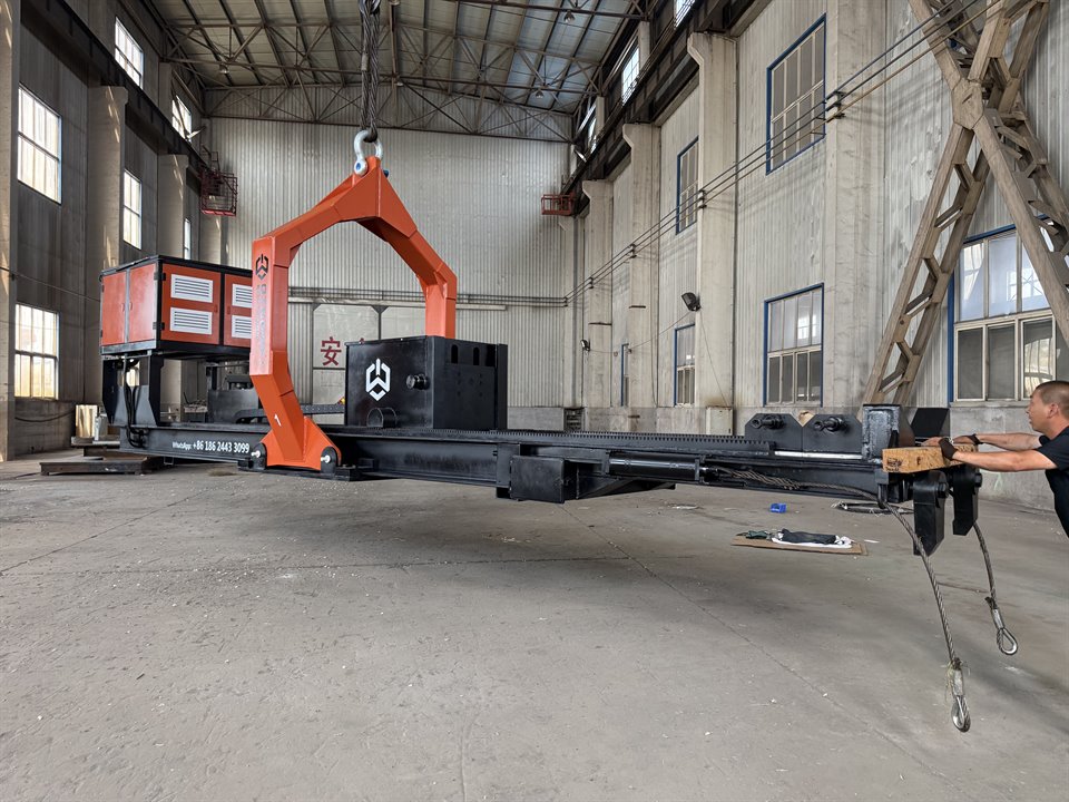 BE25 Qingwei tube bundle extractor suspended by an overhead crane in the workshop