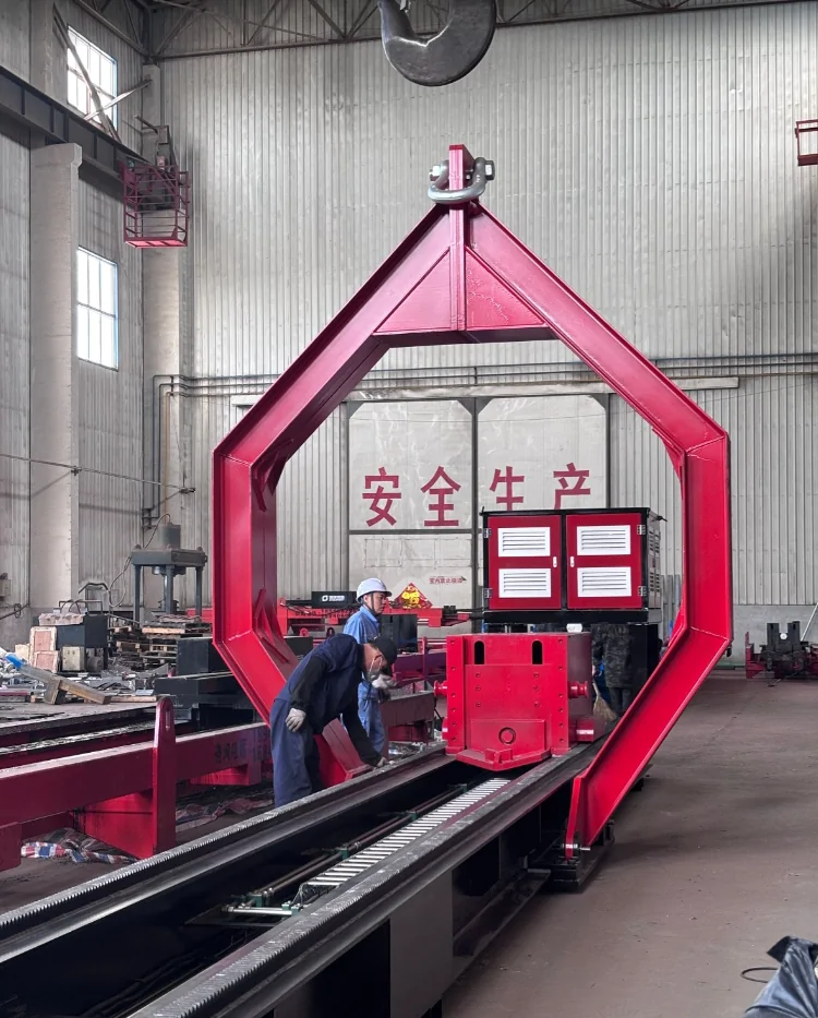 Workers aligning the red lifting frame with the Qingwei tube bundle extractor chassis