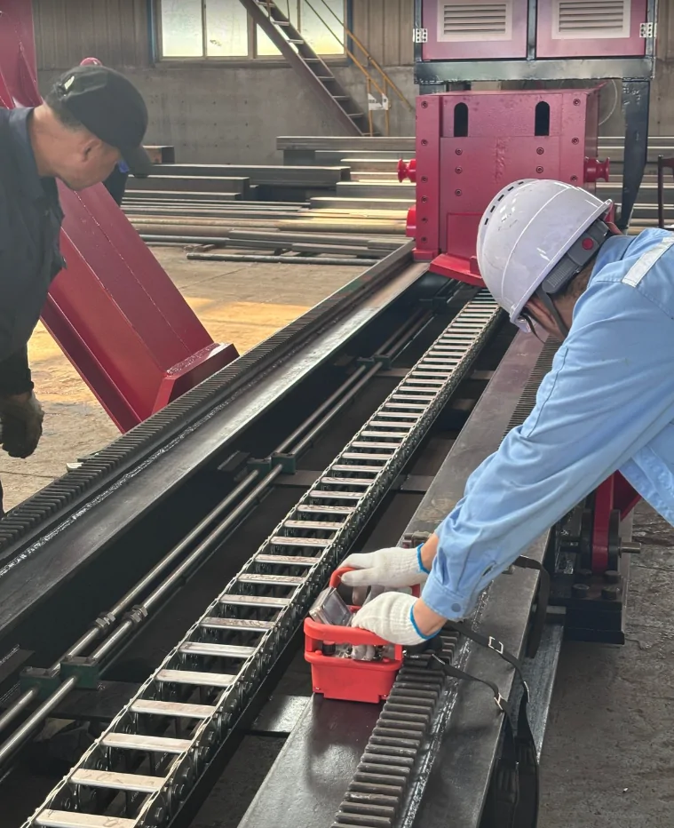 Qingwei technicians verifying the alignment of the rack and guide system on a tube bundle extractor