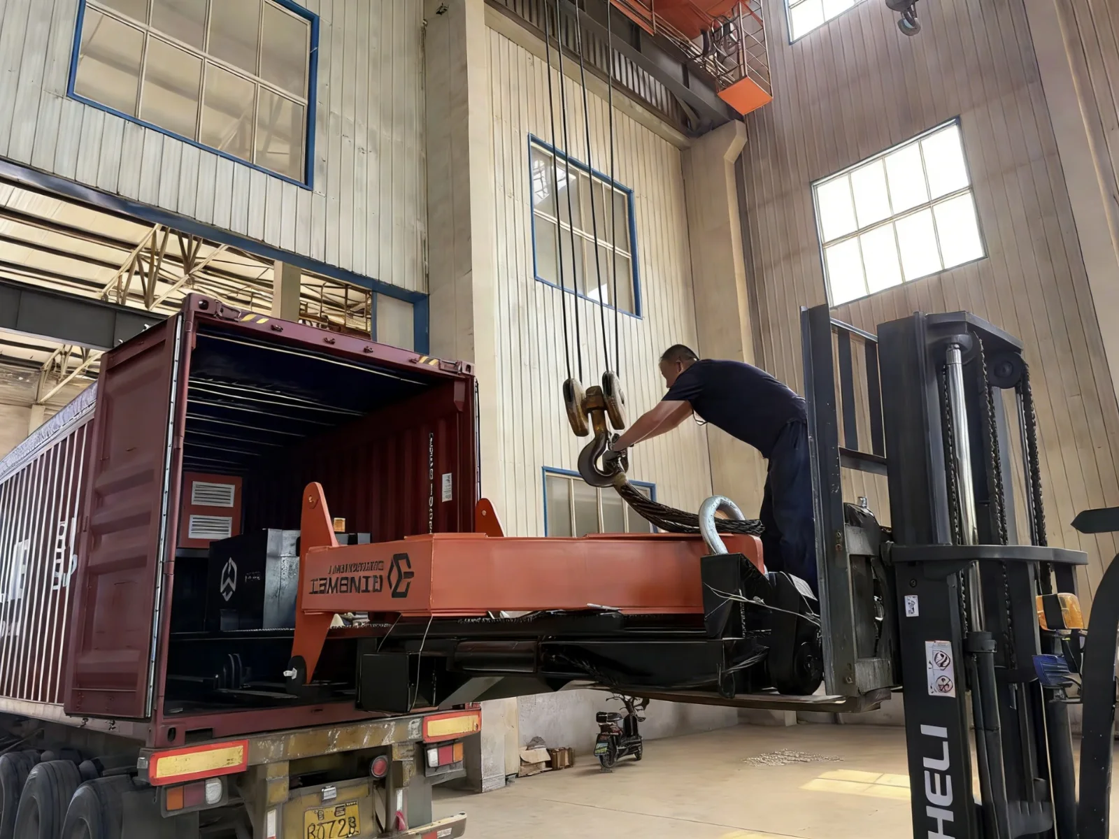 Tube bundle extractor being loaded into container for shipment